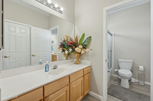 755 E Orchid Ln, Gilbert, AZ 85296 - full bathroom featuring vanity, enclosed tub / shower combo, and toilet