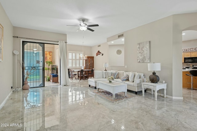 755 E Orchid Ln, Gilbert, AZ 85296 - living room with ceiling fan with notable chandelier