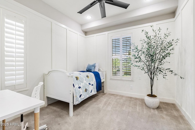 carpeted bedroom with baseboards, ceiling fan, and recessed lighting