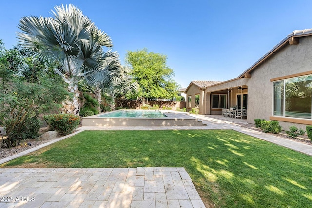 view of yard featuring a fenced in pool, a fenced backyard, and a patio