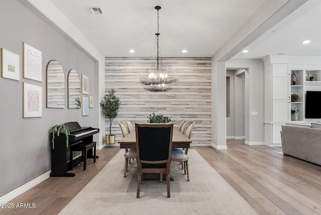 dining area featuring baseboards, recessed lighting, and visible vents