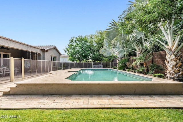 view of pool with a fenced backyard, a fenced in pool, and a patio