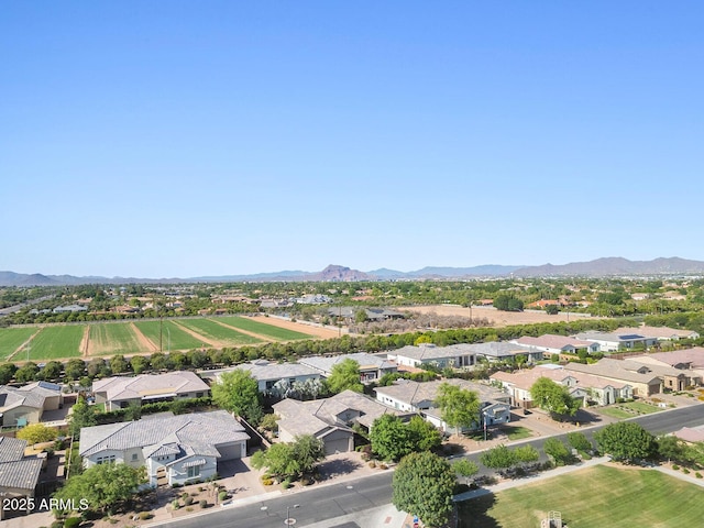birds eye view of property with a residential view and a mountain view