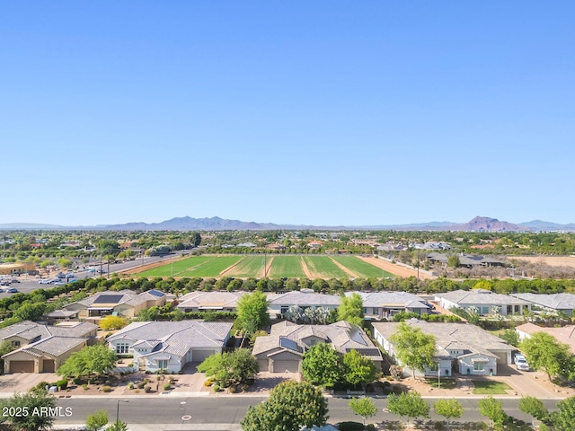 drone / aerial view featuring a mountain view and a residential view