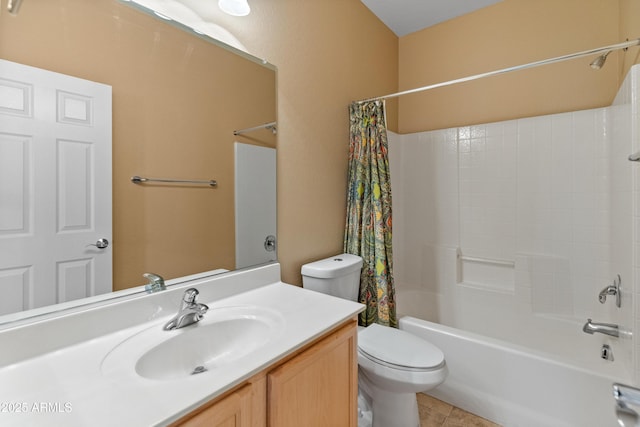 full bathroom with vanity, shower / bath combo, and toilet