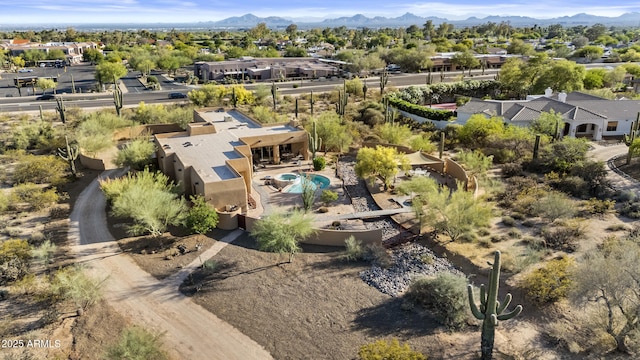 bird's eye view with a residential view and a mountain view