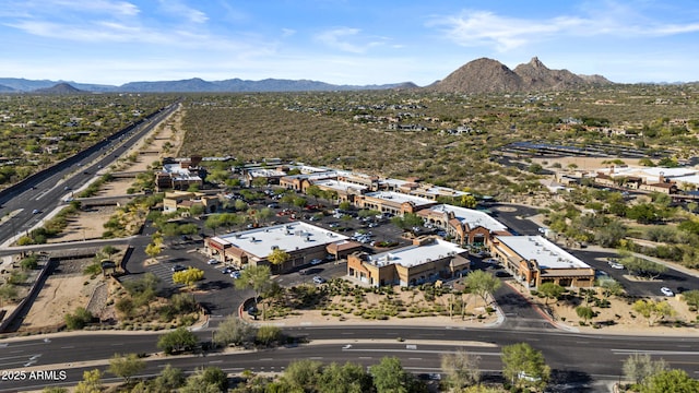 drone / aerial view featuring a mountain view