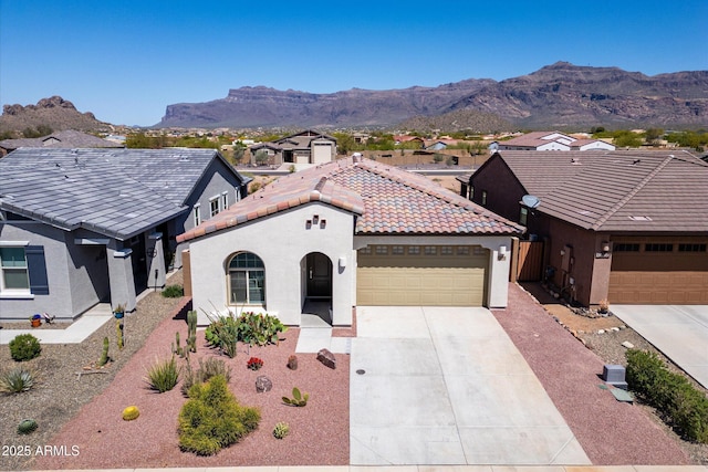 12538 E Pivot Peak, Gold Canyon, AZ 85118 - view of front of home featuring a tiled roof, a mountain view, driveway, and a garage