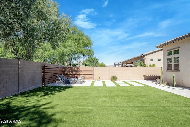 view of yard with a patio area