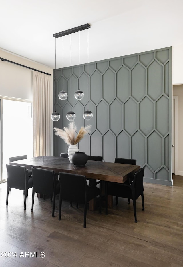 dining area with dark wood-type flooring