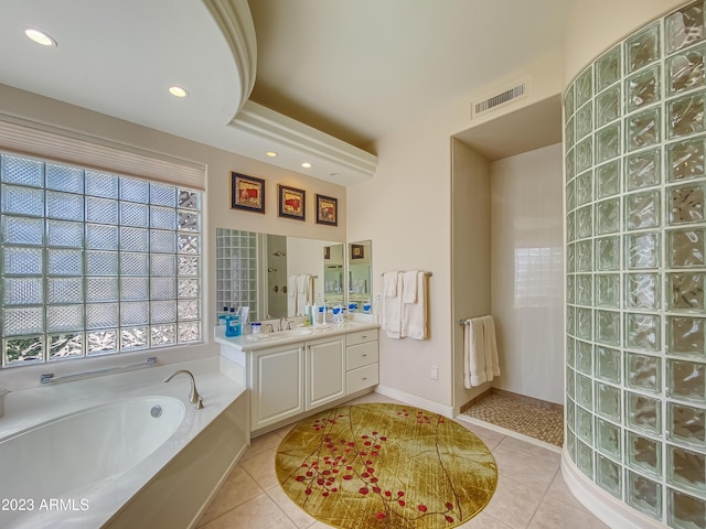 bathroom featuring visible vents, baseboards, tile patterned floors, vanity, and recessed lighting