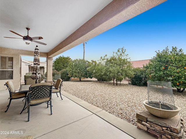 view of patio featuring ceiling fan