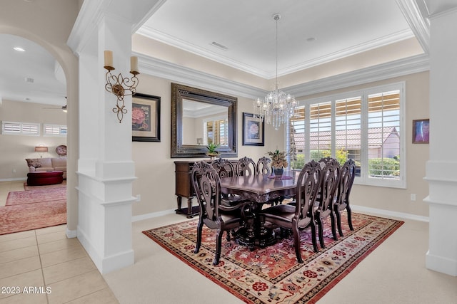 dining room featuring arched walkways, ornamental molding, light tile patterned flooring, and visible vents