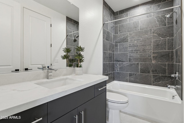 full bathroom featuring shower / tub combination, toilet, and vanity