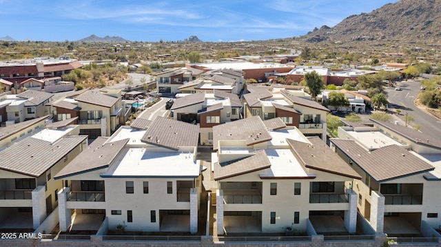 bird's eye view with a residential view and a mountain view