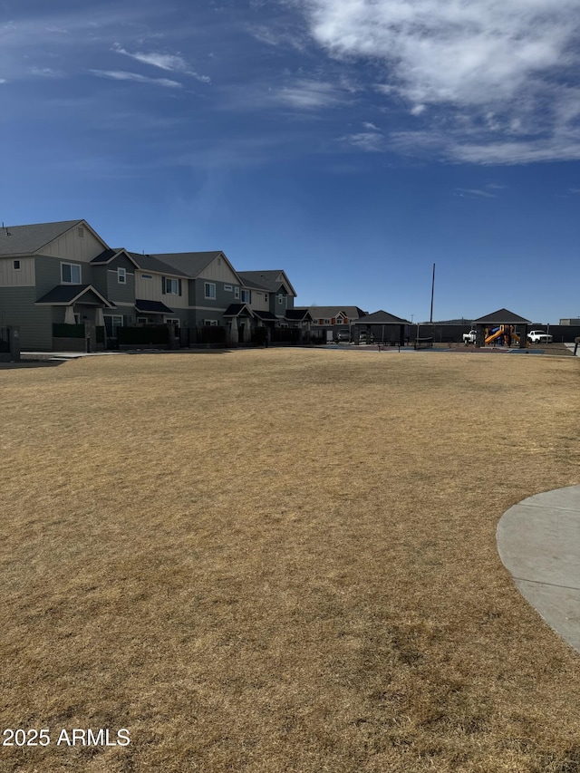 view of yard featuring a residential view