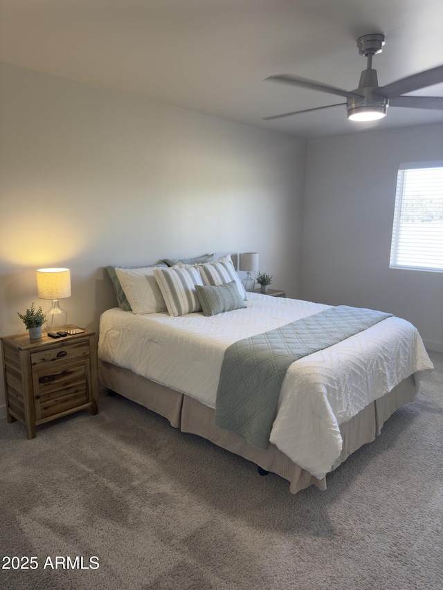 bedroom with carpet and a ceiling fan