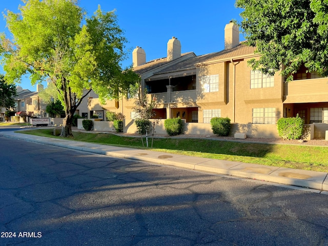 exterior space featuring a balcony