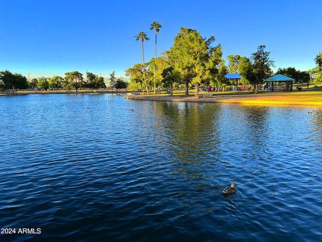 property view of water with a gazebo