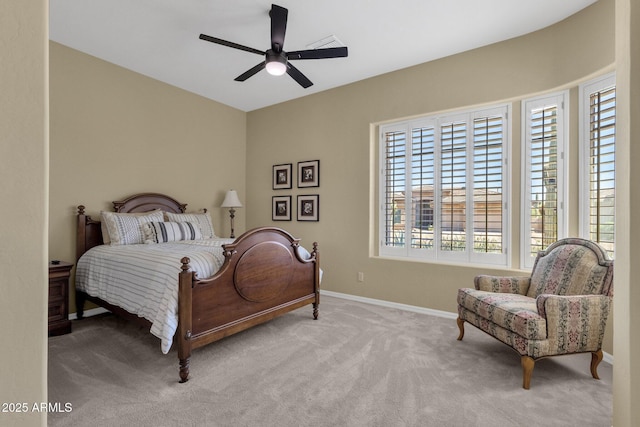 bedroom with baseboards, multiple windows, carpet, and ceiling fan