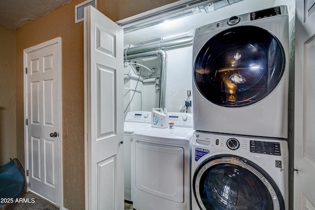 6520 E Peak View Rd, Cave Creek, AZ 85331 - washroom with stacked washer and clothes dryer