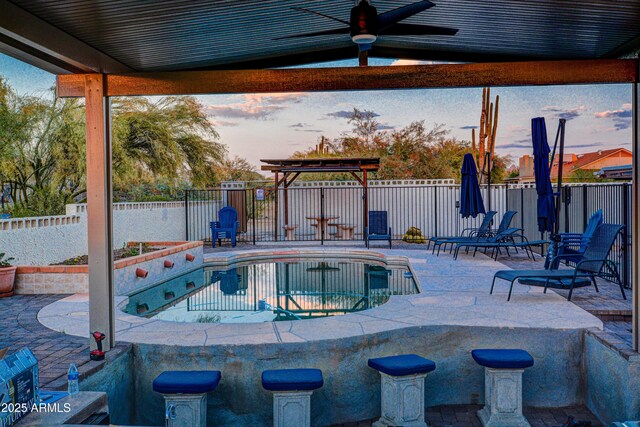 6520 E Peak View Rd, Cave Creek, AZ 85331 - pool at dusk with a fenced backyard and a patio