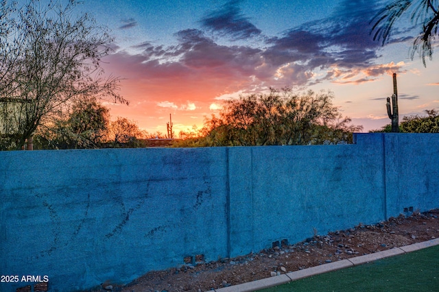 6520 E Peak View Rd, Cave Creek, AZ 85331 - yard at dusk featuring fence