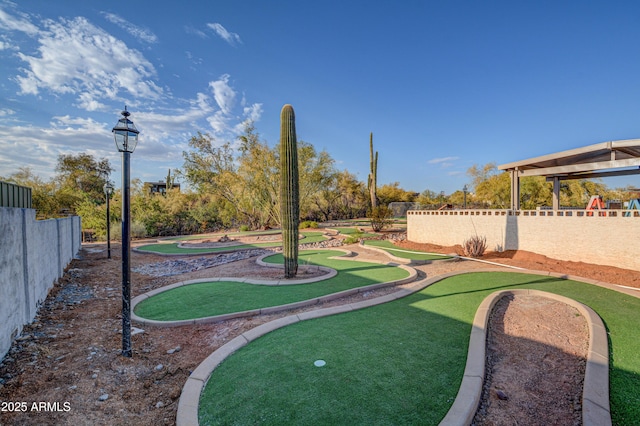 6520 E Peak View Rd, Cave Creek, AZ 85331 - view of yard with a putting area and fence