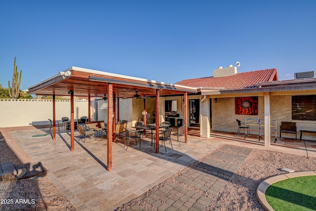 6520 E Peak View Rd, Cave Creek, AZ 85331 - view of patio / terrace featuring fence, outdoor dining space, and ceiling fan