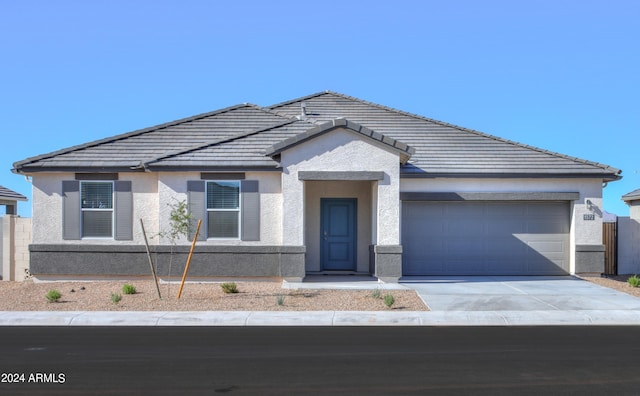 view of front of home with a garage