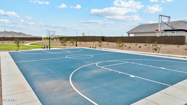 view of basketball court with a mountain view