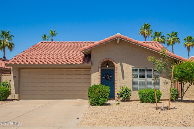 4216 E Sandia St, Phoenix, AZ 85044 - mediterranean / spanish-style home with driveway, a garage, a tiled roof, and stucco siding