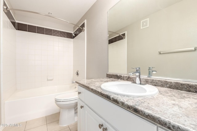 bathroom with visible vents, toilet, tile patterned flooring, shower / bath combination, and vanity