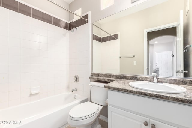 bathroom featuring shower / tub combination, vanity, and toilet