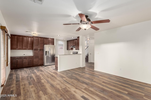 8450 S Stephanie Ln, Tempe, AZ 85284 - kitchen featuring stainless steel fridge with ice dispenser, under cabinet range hood, ceiling fan, light countertops, and dark wood-style floors