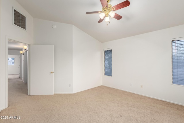 8450 S Stephanie Ln, Tempe, AZ 85284 - unfurnished bedroom with carpet flooring, vaulted ceiling, baseboards, and multiple windows