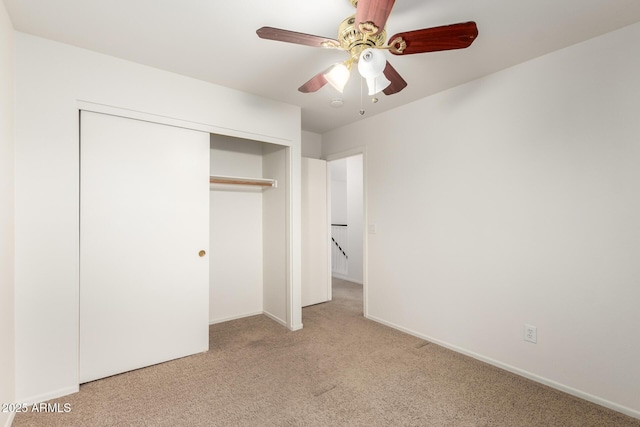8450 S Stephanie Ln, Tempe, AZ 85284 - unfurnished bedroom featuring carpet, a closet, baseboards, and a ceiling fan