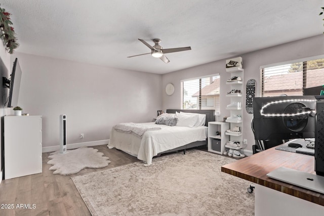 1914 S Brooks Cir, Mesa, AZ 85202 - bedroom featuring wood finished floors, baseboards, and a ceiling fan