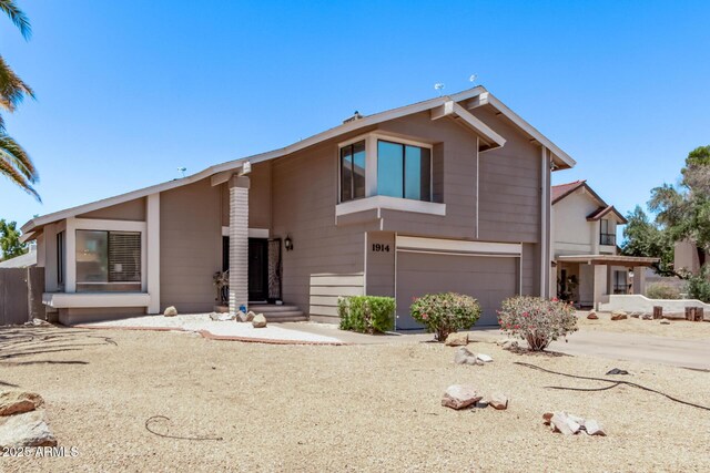 1914 S Brooks Cir, Mesa, AZ 85202 - view of front of house with a garage and driveway