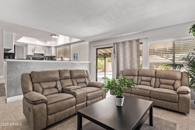 1914 S Brooks Cir, Mesa, AZ 85202 - living area with a raised ceiling and light tile patterned flooring