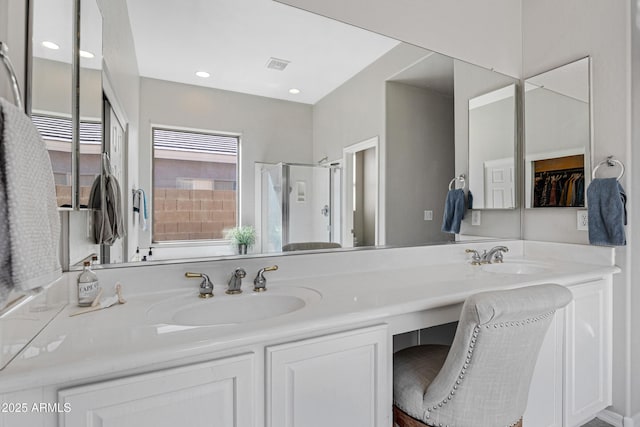 bathroom featuring vanity and walk in shower