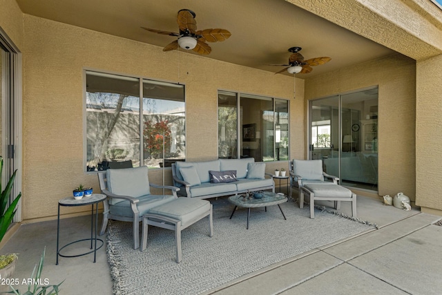 view of patio featuring ceiling fan and outdoor lounge area