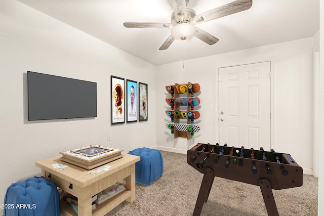 playroom featuring ceiling fan and carpet flooring