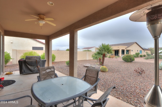 view of patio / terrace featuring ceiling fan and grilling area