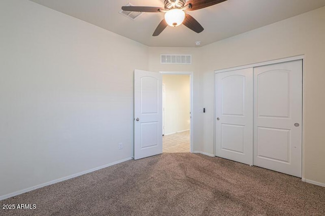1127 E Tyler Ln, Casa Grande, AZ 85122 - unfurnished bedroom featuring baseboards, visible vents, carpet, and a closet