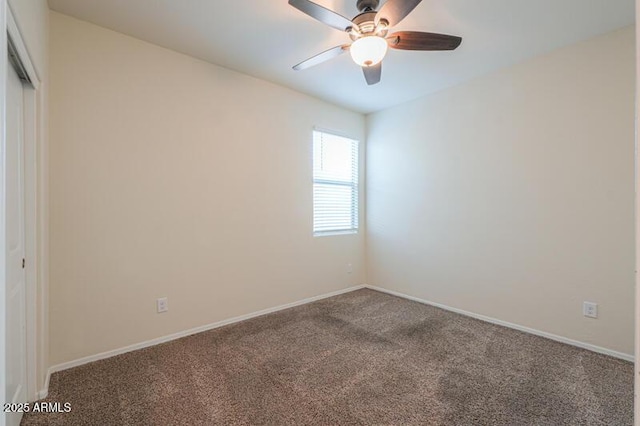 1127 E Tyler Ln, Casa Grande, AZ 85122 - unfurnished room featuring carpet floors, baseboards, and ceiling fan