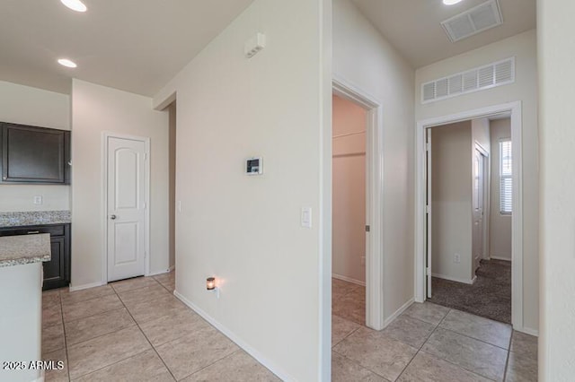 1127 E Tyler Ln, Casa Grande, AZ 85122 - corridor featuring visible vents, recessed lighting, and light tile patterned floors