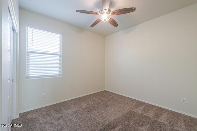 1127 E Tyler Ln, Casa Grande, AZ 85122 - carpeted spare room with baseboards and a ceiling fan