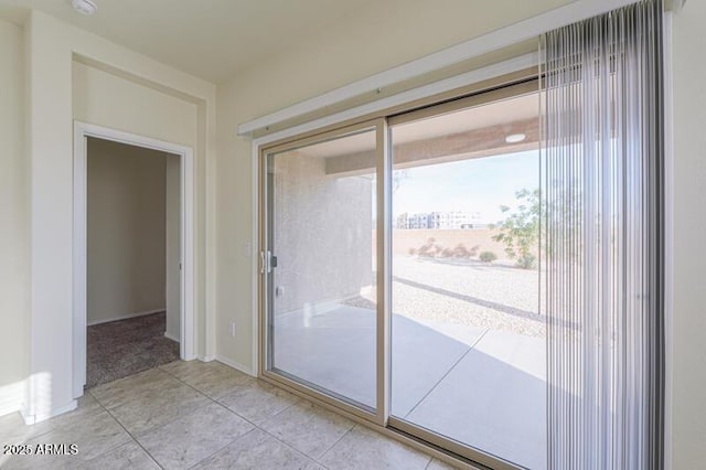 1127 E Tyler Ln, Casa Grande, AZ 85122 - doorway to outside featuring light tile patterned floors