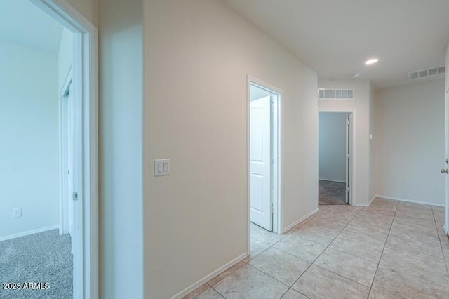 1127 E Tyler Ln, Casa Grande, AZ 85122 - hallway with visible vents, recessed lighting, baseboards, and light tile patterned flooring